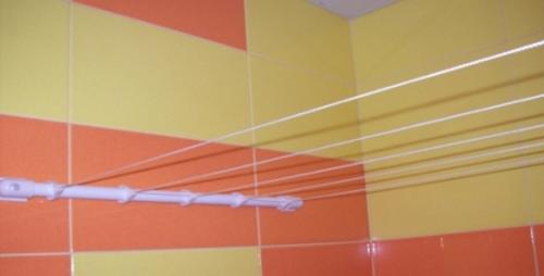 Сушилка для белья крепится к стене. Виды сушилок для белья настенных 02