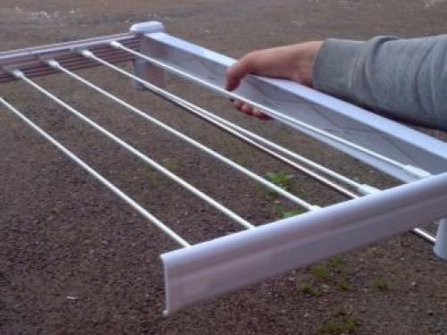 Сушилка для белья крепится к стене. Виды сушилок для белья настенных 07